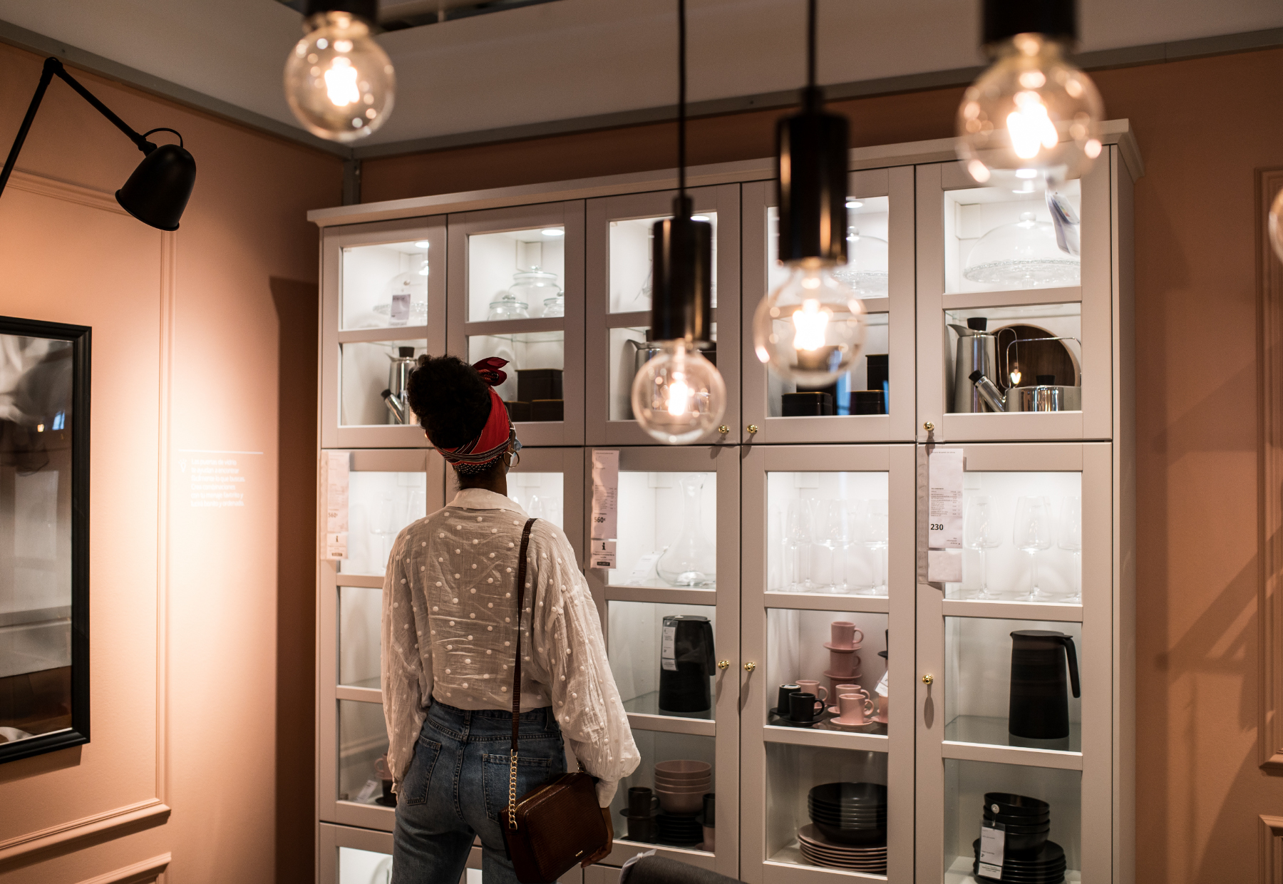 Woman looking at a bookshelf