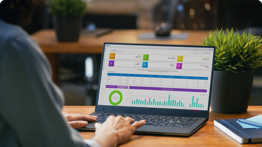 man reviewing a dashboard on his laptop