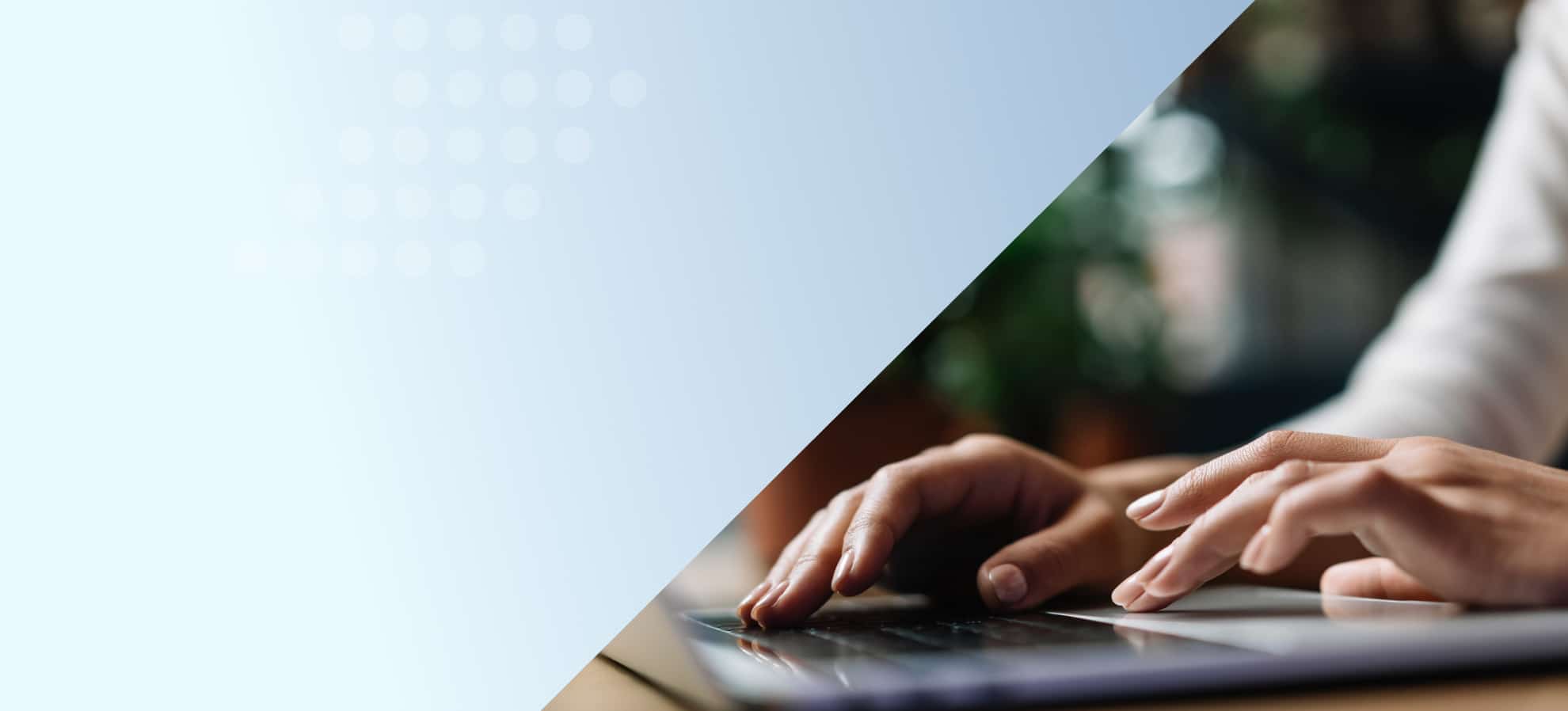 Image of person typing a blog post on laptop