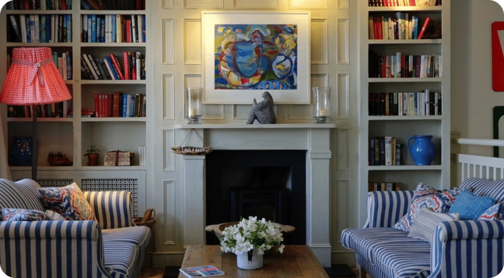 Home decor items placed on mantle above fireplace